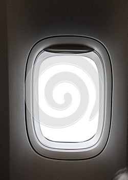 Airplane window with white isolated area inside