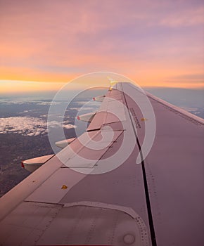 Airplane Wing At Altitude Sunrise