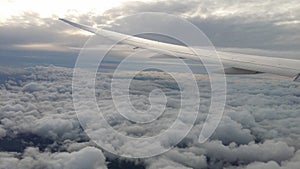 Airplane wing and Clouds