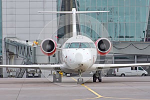 Airplane wing with engine, view under the plane during flight service