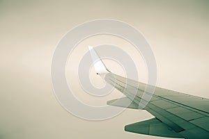 Airplane wing. Flight in the sky