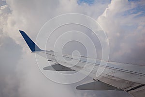Airplane wing sky clouds