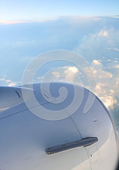 Airplane wing with turbina in the air. photo