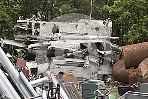 Airplane wreckage in junkyard