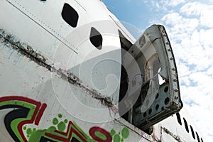 Airplane wreckage white passenger door