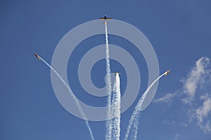 Airplanes breacking formation