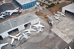 Airplanes docked at the airport, aerial view