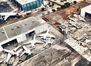 Airplanes docked at the airport, aerial view