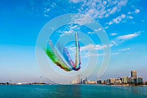 Airplanes flying above Abu Dhabi skyline for the UAE national day celebration airshow