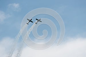 Airplanes in the sky on a cloudy day