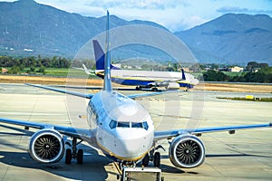 Airplanes on tarmac of Barcelona Girona airport view photo