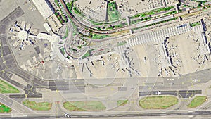 Airport aerial top view with the aircraft, the terminal building and runway