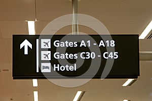 Airport Gates and Hotel Sign photo