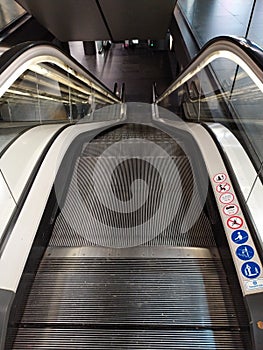 Airport Escalator. Mechanical stairs. Mechanical stairs. Deep, mechanic.