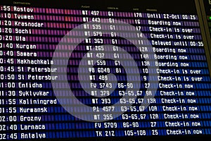 Airport flight schedule with the list of flights and information on registration