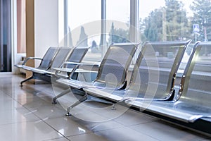 Airport gate waiting area with metal seats