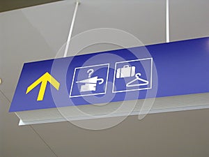 Airport lost-and-found and baggage check signs photo