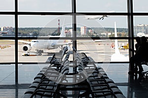 Airport lounge with a number of empty chair