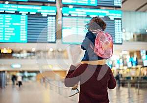 Airport, love and man with his child on his shoulders reading the schedule or time board. Trip, travel and young father