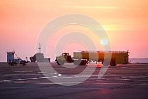 Airport refueler truck sunset