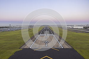 Airport runway with empty sky waiting for plane to land POV