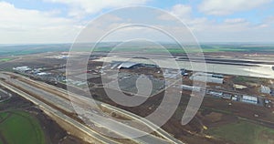 Airport and surrounding area. An aerial view of the airport hangers and surrounding area. High level aerial view of the