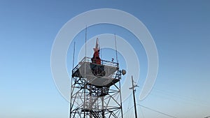 Airport surveillance radar, ASR, a radar system used at airports. A bright blue sky background