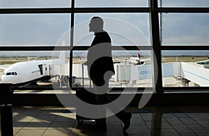 Airport, travel or silhouette man walking to airplane, flight booking or transportation for world tour. Suitcase luggage