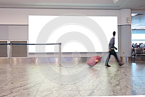 Airport traveller with blank sign