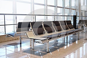 Airport waiting area seats benches flight holiday