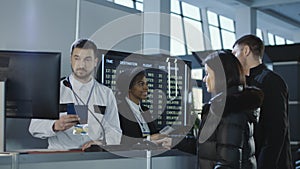 Airport workers checking documents at control point