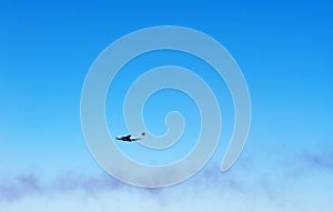 Airshow. Military aircraft Boeing Câ€“17 Globemaster flying in the blue sky