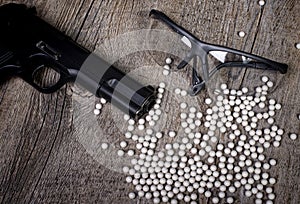 Airsoft gun with glasses