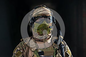 Airsoft strikeball player in military soilder