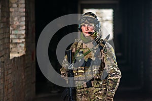 Airsoft strikeball player in military soilder