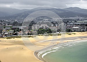 Airview of the Atlantic coast of Spain in the background of the city Laredo, hills and storm sky