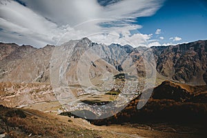 Airview of Stepantsminda town in Caucasian mountains