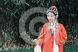 Aisa Chinese woman Peking Beijing Opera Costumes dress garden China traditional drama perform ancient Bamboo flute instruments