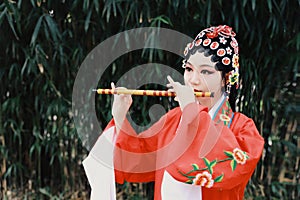 Aisa Chinese woman Peking Beijing Opera Costumes dress garden China traditional drama perform ancient Bamboo flute instruments