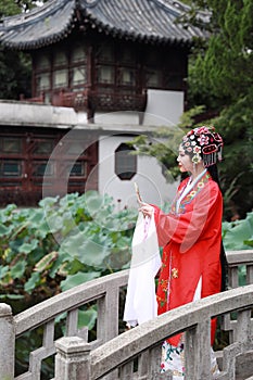 Aisa Chinese woman Peking Beijing Opera Costumes Pavilion garden China traditional role drama play bride dance perform fan ancient