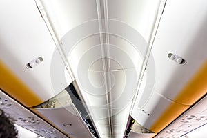 Aisle of a Boeing plane from the inside.