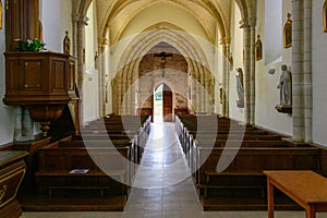 The aisle of the church in the traditional French village of Saint Sylvain in Europe, France, Normandy, towards Veules les Roses,