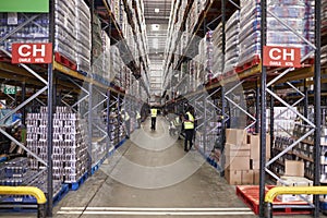 An aisle between storage units in a distribution warehouse