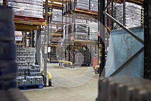 Aisles between storage racks in a distribution warehouse