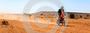 Ait Saoun, Morocco - February 23, 2016: Man riding quad bike in Ait Saoun desert in Morocco