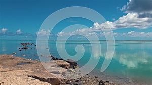 Aitutaki Lagoon Reef Sea View of Rocky Shore Coral Beach & Blue water Cook Islands