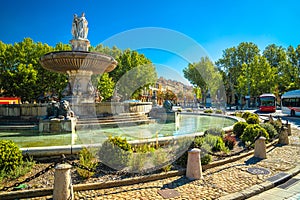 Aix en Provence fountain and cityscape view photo