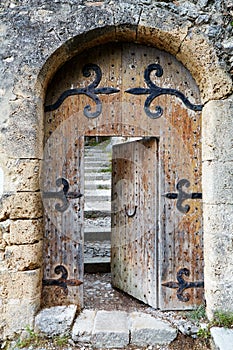Ajar old wooden door
