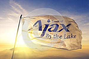 Ajax of Ontario of Canada flag waving on the top sunrise mist fog