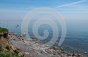 Ajax, Ontario lakefront park, rocks, sand, blue sky, Lake Ontario